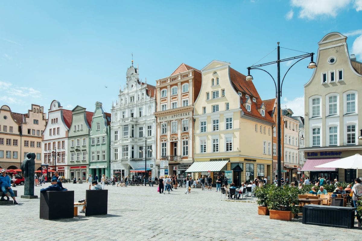 people walking on street near buildings during daytime